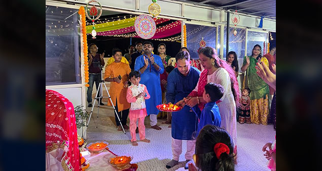 employees dancing during navratri garba night in traditional attire in 2022